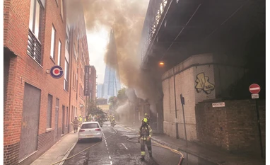 70 firefighters deployed after fire in London railway arch stops trains London railway fire