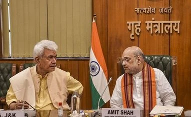 Shah asks armed forces to make border, LoC 'impregnable' for a peaceful J-K Home Minister Amit Shah, J-K LG Manoj Sinha