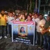 People carry a candle light march in protest against the death of a class-12 student, who was allegedly set on fire by a man in Jharkhand's Dumka district, in Ranchi