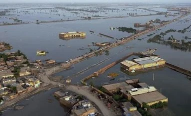 Pakistan's fatal flooding has hallmarks of global warming: An explainer Homes are surrounded by floodwaters in Sohbat Pur city, a district of Pakistan's southwestern Balochistan province