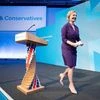 Liz Truss walks on the stage at the Queen Elizabeth II Centre on the day it is announced that she is the new Conservative party leader, and will become the next Prime Minister, in London (Photo: Reuters)