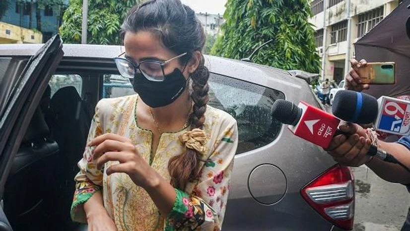 TMC MP Abhishek Banerjee's sister-in-law Maneka Gambhir arrives at CGO complex to appear before ED for questioning in connection with an alleged coal smuggling scam, in Kolkata (Photo: PTI) TMC MP Abhishek Banerjee's sister-in-law Maneka Gambhir arrives at CGO complex to appear before ED for questioning in connection with an alleged coal smuggling scam, in Kolkata (Photo: PTI)