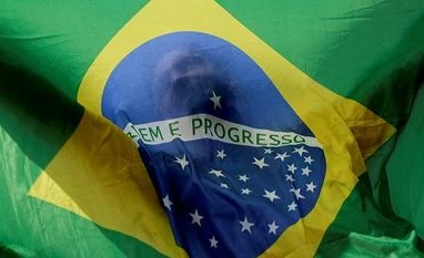 Shooting disrupts Bolsonaro-backed Sao Paulo candidate's campaign stop Brazilian flag