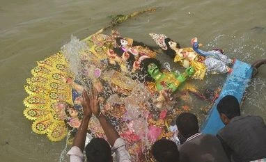 Curtains down on Durga puja festival in West Bengal with idol immersion Idol of Goddess Durga being immersed in the Ganga river