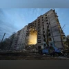 Russian missiles target Ukraine's Kyiv and Kharkiv, at least 3 killed A view shows a residential building heavily damaged by a Russian missile strike, amid Russia's attack on Ukraine, in Zaporizhzhia