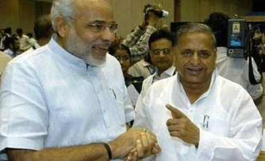 From trading barbs to walking hand-in-hand:Modi-Mulayam unique relationship Narendra Modi, Mulayam Singh Yadav