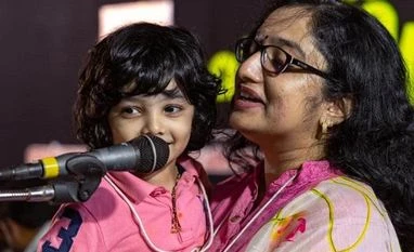 Woman IAS gives speech while holding son, triggers debate on social media Divya S Iyer, District Collector of Kerala's Pathanamthitta with her son