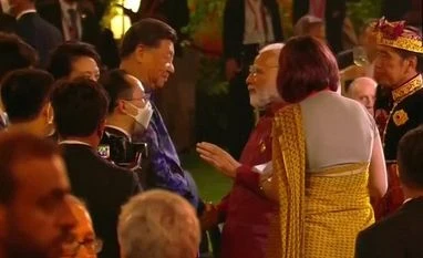 PM Modi, Chinese President Xi shake hands at side event at G20 Summit Narendra Modi, Xi Jinping