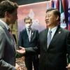 Chinese President Xi Jinping and Canadian Prime Minister Justin Trudeau