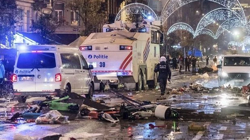 Brussels Brussels: Police cars drive through a main boulevard in Brussels, Sunday, Nov. 27, 2022, as violence broke out during and after Morocco's 2-0 win over Belgium at the World Cup. (AP/PTI Photo)