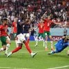 Randal Kolo Muani scoring a goal for France against Morocco in semi-final of FIFA World Cup 2022