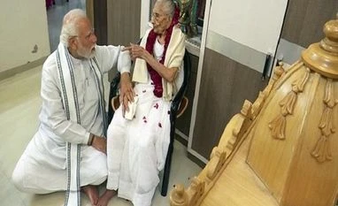 Prime Minister Narendra Modi with his mother Heeraben Modi Prime Minister Narendra Modi with his mother Heeraben Modi