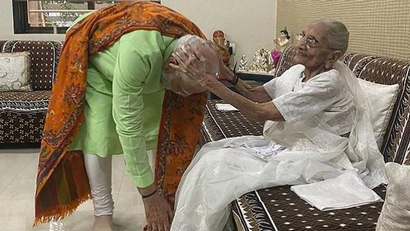 Prime Minister Narendra Modi with his mother Heeraben Modi Prime Minister Narendra Modi with his mother Heeraben Modi