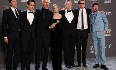 The Banshees of Inisherin Director Martin McDonagh, cast members and crew of "The Banshees of Inisherin" pose with their award for Best Motion Picture in a Musical or Comedy, at the 80th Annual Golden Globe Awards in Beverly Hills, California, U.S., January 10, 2023