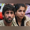 Wrestlers Bajrang Punia and Sakshi Malik during a press conference after a meeting with officials of Union Sports Ministry regarding their protest against the WFI, in New Delhi, Jan. 19, 2023. (PTI) Bajrang Punia, Sakshi Malik