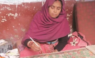 madhubhani painting Typical microfinance borrowers are families with monthly income of Rs 25,000 or less. (BS Photo)