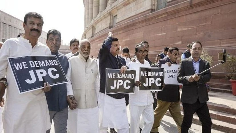 AAP MPs of AAP and BRS stage a protest demanding joint parliamentary committee (JPC) probe into Adani row following Hindenburg's report during Budget Session of Parliament, in New Delhi, Thursday, Feb. 9, 2023. (PTI)