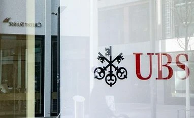 Credit Suisse takeover; Moody's downgrades outlook for UBS to negative UBS, Credit Suisse