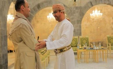 Saudi, Omani delegation hold peace talks in Yemen with Houthi leaders The head of the Houthi Supreme Political Council, Mahdi al-Mashat, shakes hands with an Omani official at the Republican Palace in Sanaa