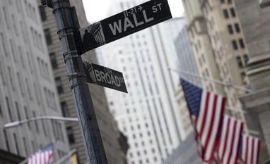 S&P 500 inches higher, dollar weakens as soft data supports Fed pause Wall Street