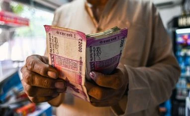 Banks set for a profit boost as RBI calls for withdrawal of Rs 2,000 notes Rs 2,000 note