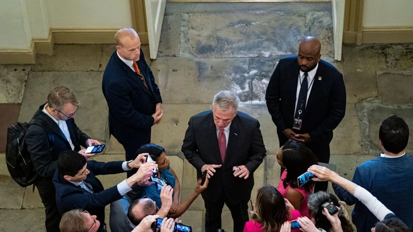 US House Speaker Kevin McCarthy, a Republican from California, center, speaks to members of the media while arriving at the US Capitol in Washington, DC, US, on Thursday, May 25, 2023. US House Speaker Kevin McCarthy, a Republican from California, center, speaks to members of the media while arriving at the US Capitol in Washington, DC, US, on Thursday, May 25, 2023.