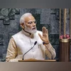 Prime Minister Narendra Modi addresses a gathering inside the Lok Sabha chamber, at the new Parliament building in New Delhi, Sunday. Photo: PTI