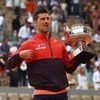 Novak Djokovic poses with the trophy after winning the French Open and his 23rd Grand Slam. Photo: Reuters