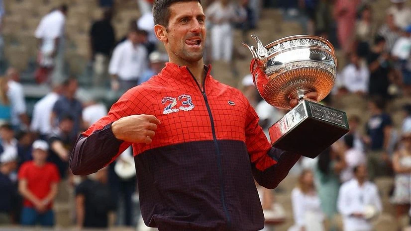 Novak Djokovic poses with the trophy after winning the French Open and his 23rd Grand Slam. Photo: Reuters Novak Djokovic poses with the trophy after winning the French Open and his 23rd Grand Slam. Photo: Reuters