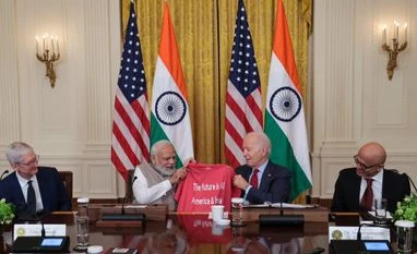 Ambitious plans for US-India technology sharing face export rules hurdle Biden gifts "The future is AI-America and India" T-Shirt gift highlights PM Modi's quote
