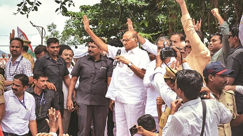 NCP Chief Sharad Pawar addresses supporters, in Maharashtra's Karad on Monday Photo: PTI NCP Chief Sharad Pawar addresses supporters, in Maharashtra's Karad on Monday Photo: PTI