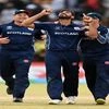 Scotland cricket team members celebrate as they beat Zimbabwe in the CWC Qualifier. Photo: Cricket Scotland