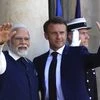 Indian Prime Minister Narendra Modi and French President Emmanuel Macron wave before their talks at the Elysee Palace in Paris, Friday, July 14, 2023. Photo: AP/PTI