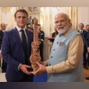 PM Modi gifts sandalwood replica of sitar, Pochampally silk to Prez Macron PM Modi gifts sandalwood replica of sitar to President Macron