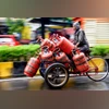 ATF price slashed 4.6%, commercial LPG up Rs 39 per 19-kg cylinder Delivery man transports LPG cylinders on a cart