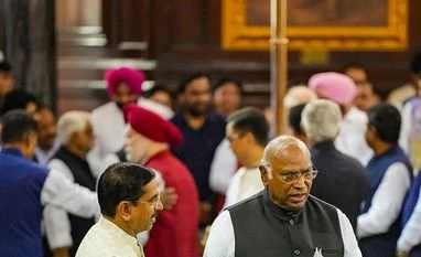 Union Minister for Parliamentary Affairs Pralhad Joshi speaks with Leader of Opposition in the Rajya Sabha Mallikarjun Kharge Union Minister for Parliamentary Affairs Pralhad Joshi speaks with Leader of Opposition in the Rajya Sabha Mallikarjun Kharge