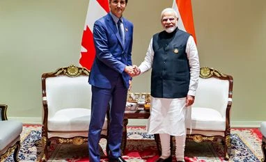 Asean Summit: PM Modi meets Canadian counterpart Justine Trudeau at Laos Prime Minister Narendra Modi with Canadian Prime Minister Justin Trudeau