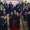 Putin visits 'dear friend Xi Jinping' in show of no-limits partnership
