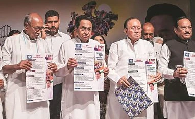 MP Congress President Kamal Nath (second from left) with others at the release of the party’s manifesto, in Bhopal photo: pti MP Congress President Kamal Nath (second from left) with others at the release of the party’s manifesto, in Bhopal photo: pti