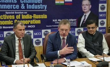 In India, Russia calls for 'extra efforts' to overcome payment hurdles Russian Ambassador to India Denis Alipov (C) with Consul General of Russian Federation in Kolkata Alexey M. Idamkin (L) and former president of Merchants' Chamber of Commerce & Industry (MCCI) Rishabh C Kothari