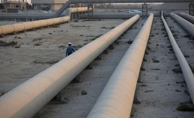 Shortage of heavy oil spells higher cost for shippers, road builders Oil storage tanks, pipes