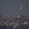 An Israeli army flare is seen over the Gaza Strip