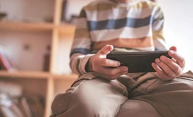 US regulators propose new online privacy safeguards for children: Report phone addiction child phone kid mobile