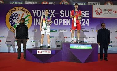 Shi Yu Qi ndia Open 2024 Men's Singles winner China's Shi Yu Qi (R) and runner up Hong Kong's Lee Cheuk Yiu (L) on podium at IG Stadium, New Delhi on Sunday. Photo: BAI