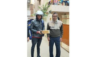 A Flipkart customer receiving a product in Patna as part of a same-day delivery initiative launched by the company A Flipkart customer receiving a product in Patna as part of a same-day delivery initiative launched by the company