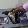 India's currency is likely to appreciate to 81 per dollar by end-December from around 82.9 on Tuesday.  Photographer: Dhiraj Singh/Bloomberg
