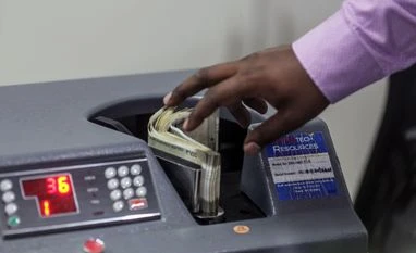 Global index inclusion inflows help Indian Rupee buck EM currency losses India’s currency is likely to appreciate to 81 per dollar by end-December from around 82.9 on Tuesday. Photographer: Dhiraj Singh/Bloomberg