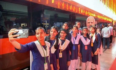 School students pose for selfies before boarding the Patna-Lucknow Vande Bharat train during its flag-off by Prime Minister Narendra Modi via video conferencing from Gujarat's Ahmedabad, at Patna railway station, Tuesday, March 12, 2024 (PTI Photo) School students pose for selfies before boarding the Patna-Lucknow Vande Bharat train during its flag-off by Prime Minister Narendra Modi via video conferencing from Gujarat's Ahmedabad, at Patna railway station, Tuesday, March 12, 2024 (PTI Photo)