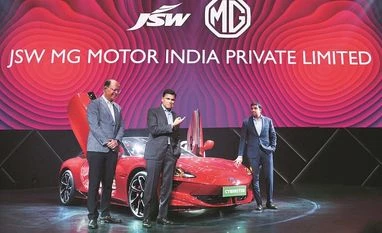 JSW MG Motor India to invest Rs 5,000 cr; focus on new energy vehicles Rajeev Chaba, CEO Emeritus of MG Motor India with Sajjan Jindal, chairman of JSW Group, and Parth Jindal, member of steering committee of JSW MG Motor India