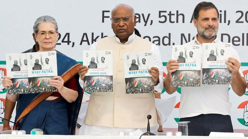 Senior leaders of India's main opposition Congress Party Sonia Gandhi and Rahul Gandhi, along with Mallikarjun Kharge, President of the Congress Party, display the party's manifesto for the general election (Photo: REUTERS) Senior leaders of India's main opposition Congress Party Sonia Gandhi and Rahul Gandhi, along with Mallikarjun Kharge, President of the Congress Party, display the party's manifesto for the general election (Photo: REUTERS)